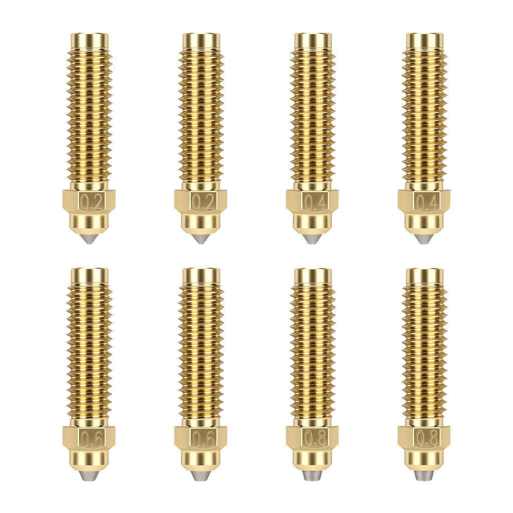 Gros plan : deux buses de chaque diamètre, Ø 0,2, 0,4, 0,6 et 0,8 mm